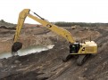 Аренда экскаватора с длинной стрелой Caterpillar